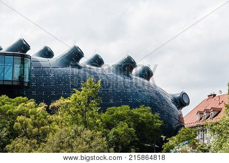 Graz, Austria - August 11, 2017: Kunsthaus Graz is a musem of Art. Low angle view a cloudy day