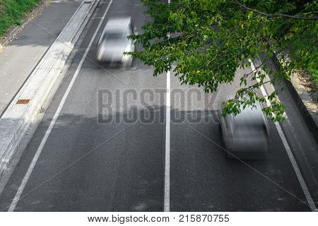 Motion blur of cars in aerial view over the road. (Speed limits - Infractions - Speed Camera)