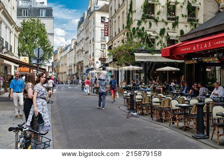 PARIS,FRANCE - AUGUST 1,2017 : Street scene with outdoor cafes at the Latin Quarter in Paris