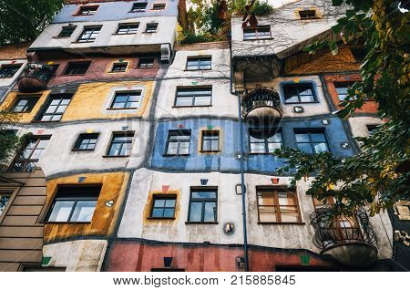 The view of facade of Hundertwasser house with multicolored walls in Vienna Austria