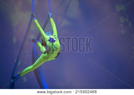 Belarus Gomel June 13 2017 Palace of Culture performance of the Abel Folk CircusA girl dancing a dance on canvases.Children's sports. Girl gymnast. Straight tricks