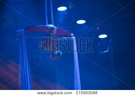 Belarus Gomel June 13 2017 Palace of Culture performance of the Abel Folk CircusA girl dancing a dance on canvases.Children's sports. Girl gymnast. Straight tricks