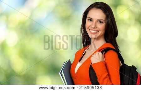 Young student teenage girl college student high school student isolated holding