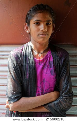 Kamalighat, India, November 6, 2017 : Portrait Of A Young Girl In The Train. Train Travels Through T