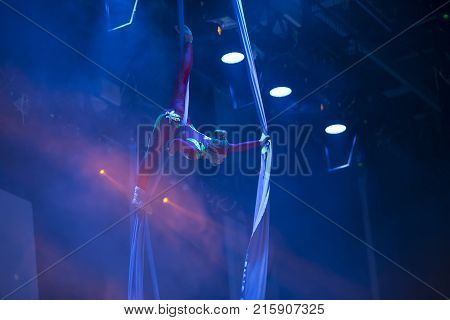Belarus Gomel June 13 2017 Palace of Culture performance of the Abel Folk CircusA girl dancing a dance on canvases.Children's sports. Girl gymnast. Straight tricks