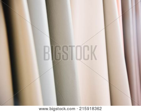 Color palette sample of leather material as a background.