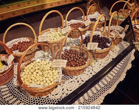 Chocolate biscuits lie on the shop window in the store