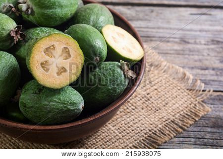 Tropical fruit feijoa . Healthy vegetarian food background