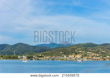 Few Boats And Ships In Elba Bay Near Italy Tuscany
