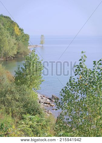 Morning quietude is viewed from a bluff overlooking Lake Huron near the tip of Michigan. Great Lakes.