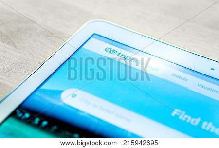 JYVASKYLA FINLAND - JULY 1 2017: Tripadvisor website and home page on tablet screen. Tripadvisor is a travel site for customer reviews and ratings. Editorial.