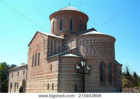 The ancient temple preserved in our times built in the ninth century. The main attraction of the city is Pitsunda. Smooth walls are made of huge stones of red and white color for many centuries served as a reliable protection. The windows are narrow and t