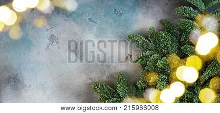 Christmas background with efresh vergreen tree banches banner