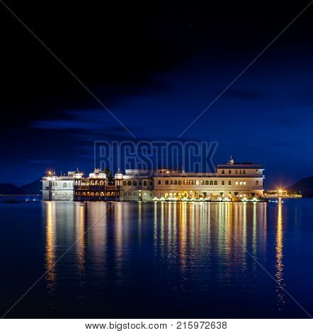 Lake Pichola and Taj Lake Palace at night Udaipur Rajasthan India Asia.