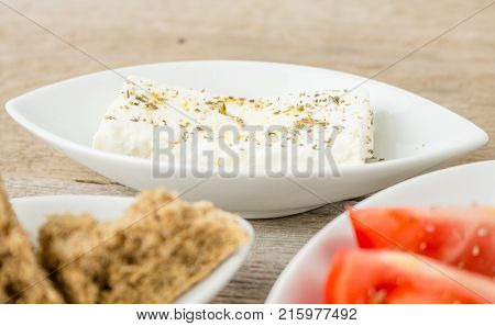 Greek Appetizers feta tomatoes and rusks. Mediterranean traditional healthy food.