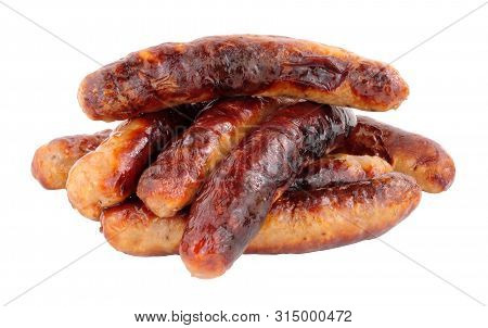 Group Of Grilled Chipolata Sausages Isolated On A White Background