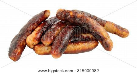 Group Of Grilled Chipolata Sausages Isolated On A White Background