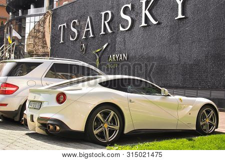 Kiev, Ukraine - May 3, 2019: White Ferrari F12 Berlinetta In The City