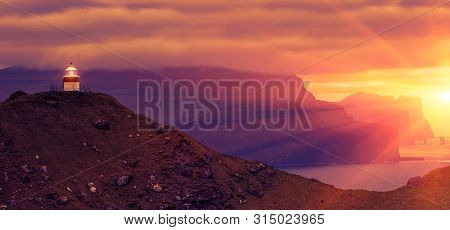 Shot Of Beautiful Panoramic Scene, Kalsoy Island and Kallur lighthouse, Faroe Islands