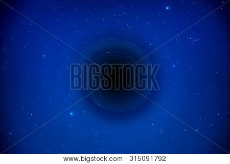 Black Hole On Night Dark Sky With Bright Stars As Nature Milky Way Space Background