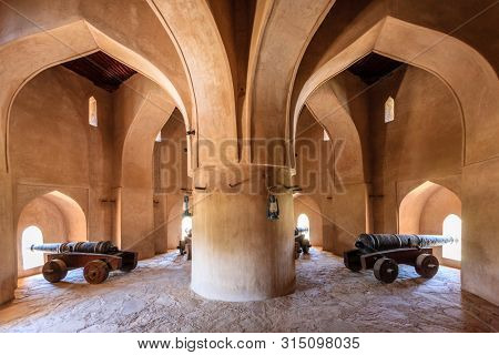 Rustaq, Oman, May 28, 2016: old cannons in a tower in Rustaq Fort, Oman
