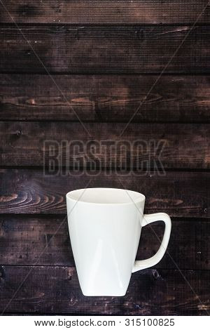 Single Coffee Mug On A Wooden Table Background - Java Espresso With Copy Space