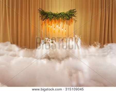 Beautiful Decoration Setup For Wedding Ceremony, With Decorative Smoke