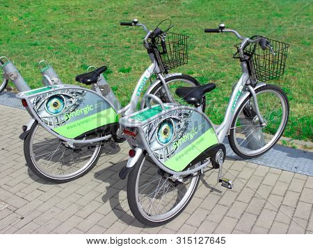 Poland, Belostok - July 13, 2019. Bicycles Are At The Station. Urban Ecological Transport For Hire. 
