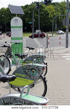 Poland, Belostok - July 13, 2019. Bicycles Are At The Station. Urban Ecological Transport For Hire. 