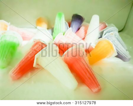 Red, Orange, Green and white jellies isolated on white background