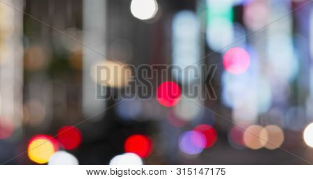 Blur view of city street at night