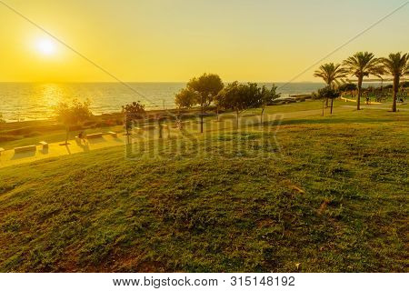Haifa, Israel - July 31, 2019: Sunset View Of Hecht And Shikmona Parks And The Beach Promenade, With