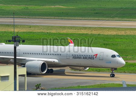 Saigon, Vietnam - Jul 13, 2019. Hl7578 Asiana Airlines Airbus A350-900 Taxiing On Runway Of Tan Son 