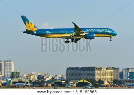 Airplane Landing At Saigon Airport, Vietnam