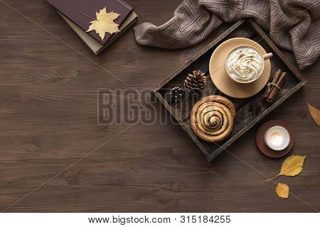 Cozy Home And Hygge Concept. Seasonal Autumnal Composition With Soft Plaid, Coffee Latte, Fresh Past