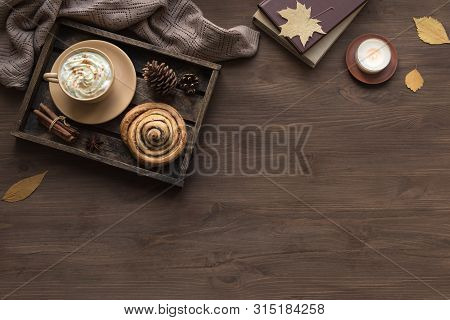Cozy Home And Hygge Concept. Seasonal Autumnal Composition With Soft Plaid, Coffee Latte, Fresh Past