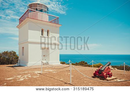 Iconic Cape Borda Lighthouse With Cannon On A Bright Summer Day, Kangaroo Island, South Australia