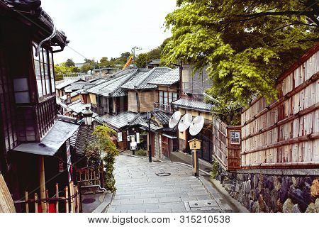 Kyoto, Japan - April 17th, 2018: View Down A Path Of Traditional Japanese Architecture And Design In
