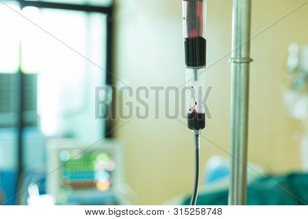 Blood Of Donor Giveing Patient At Icu Room In Hospital.