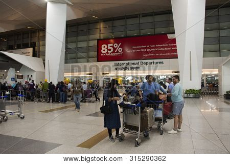 Indian People And Foreign Travelers Walking Waiting And Shopping In Shop Inside Of Indira Gandhi Int