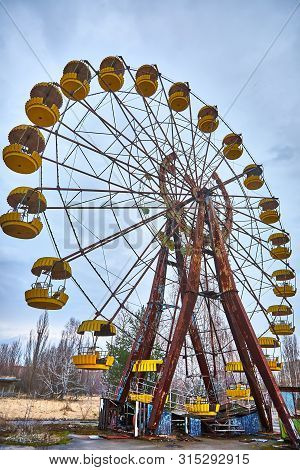 Old Ferris Wheel In The Ghost Town Of Pripyat. Consequences Of The Accident At The Chernobil Nuclear