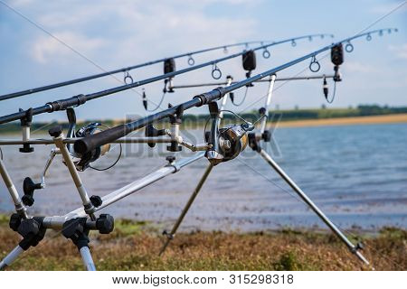 Carp Fishing. Rods On A Rod Pod With The Swingers Attached Ready To Catch Some Fish.