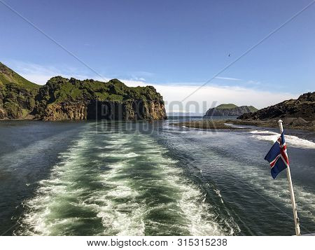 View Of Volcanic Cliffs And Islands In Vestmanneyjar (westman Islands) Harbor In South Iceland, Seen