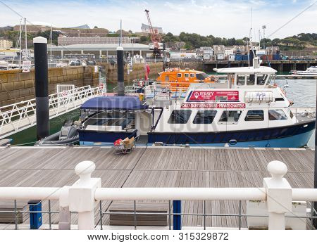 St Helier, Jersey, United Kingdom, - 07, 25, 2019: Sea Trip Tours At The Marina And Port Facilities