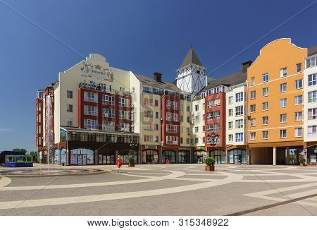 German Village, Krasnodar, Russia - June 09, 2019: The Girl Walks Past The Fountain In I. M. Rotman 