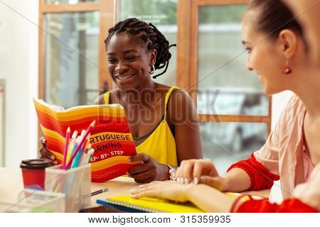 Attractive African American Woman Visiting Language School