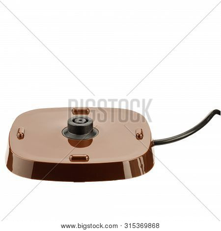 Base Unit For Beige And Brown Color Plastic Cordless Electrical Kettle Isolated On The White Backgro
