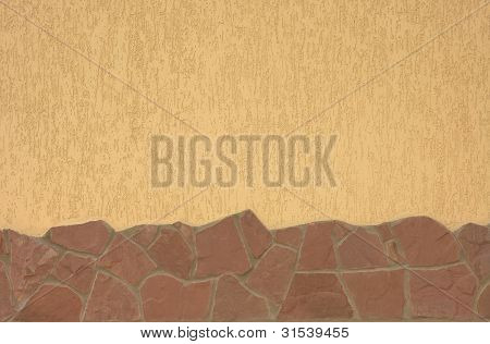Un muro con un bordo di pietra