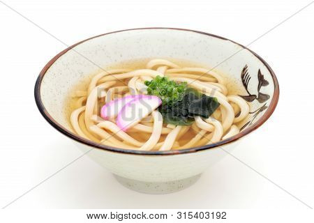 Japanese Kake Udon Noodles In A Ceramic Bowl On White Background