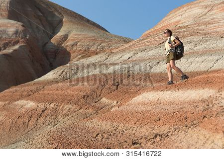 Backpacker Girl Exploring The Mountains. Backpacker Girl Tourist Exploring The Xizi Mountains , Azer
